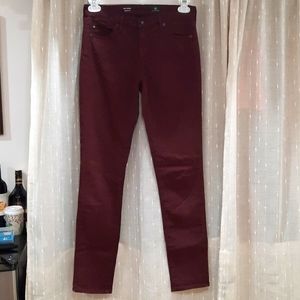 burgundy colored trousers